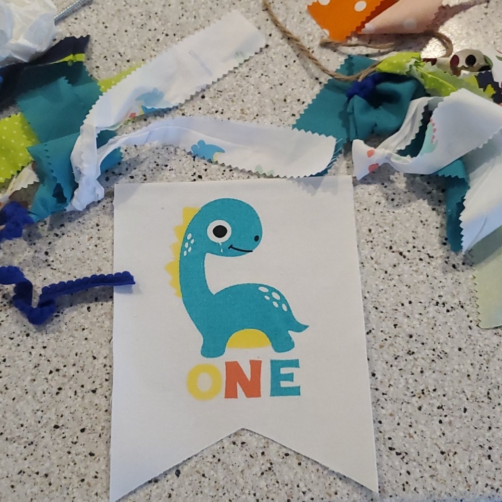 Dinasour ONE banner and cake topper